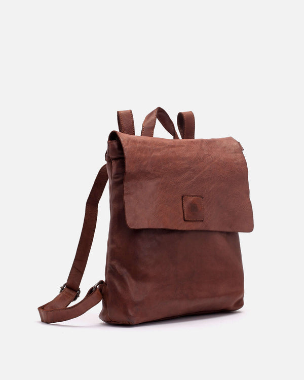 Side view of the Brown Boston Leather Backpack showcasing straps for carrying and frontal flap closure
