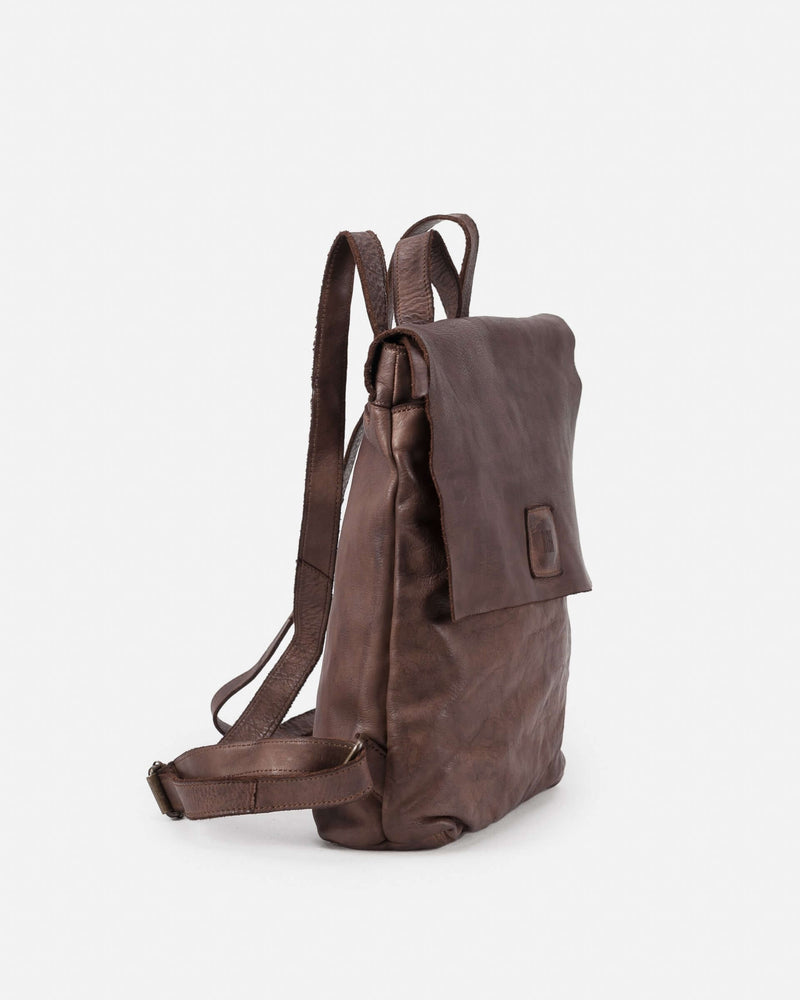 Close-up side view of the shoulder straps on the brown Boston Leather Backpack